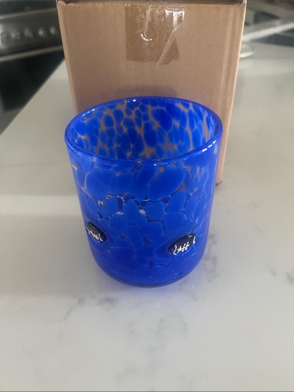 Anthropologie icon juice glass blue football